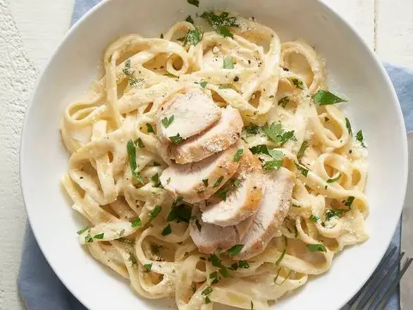 Chicken Fettuccine at Western Pizza Red Deer — creamy pasta with tender chicken